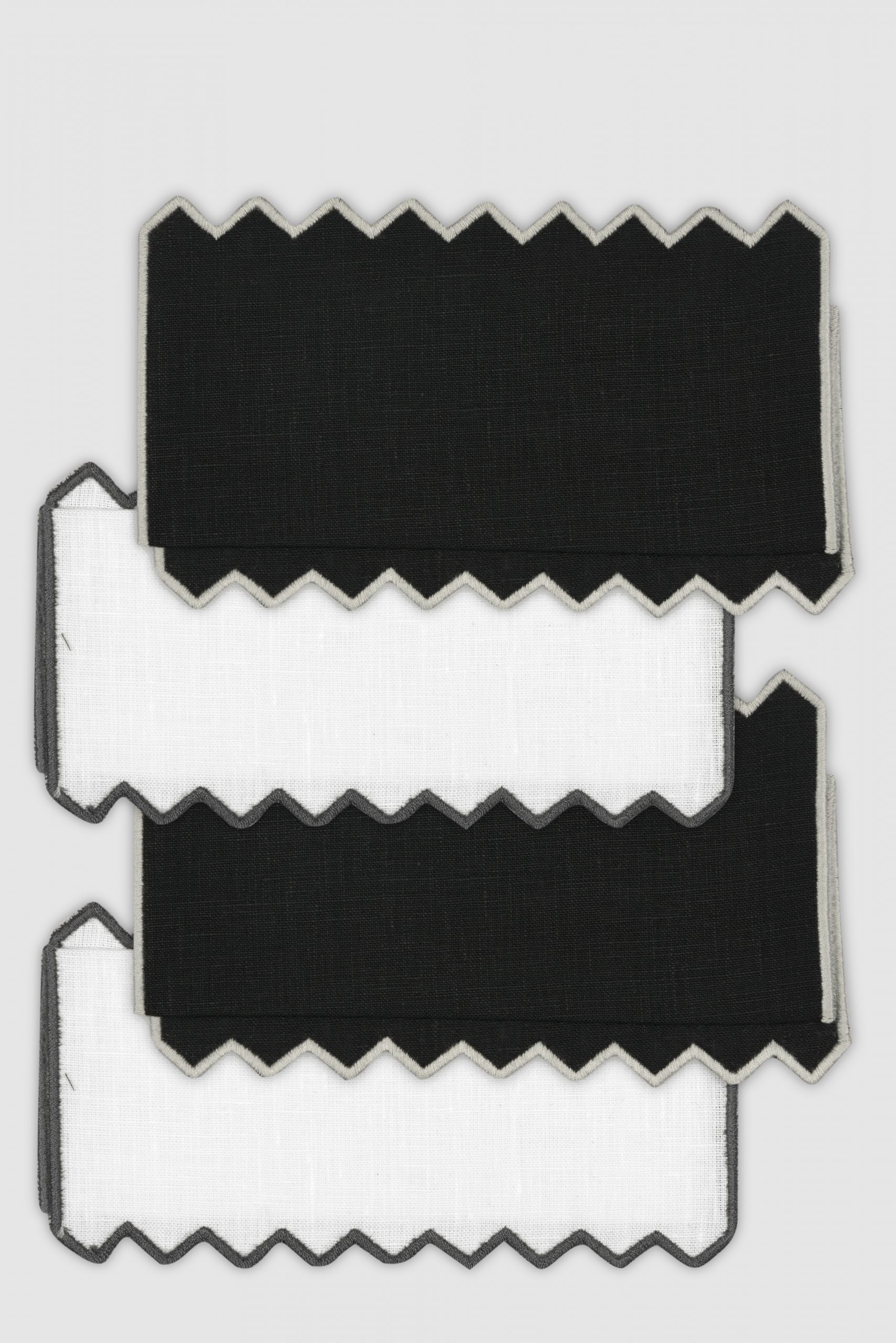 set of four triangu black/grey cocktail napkins